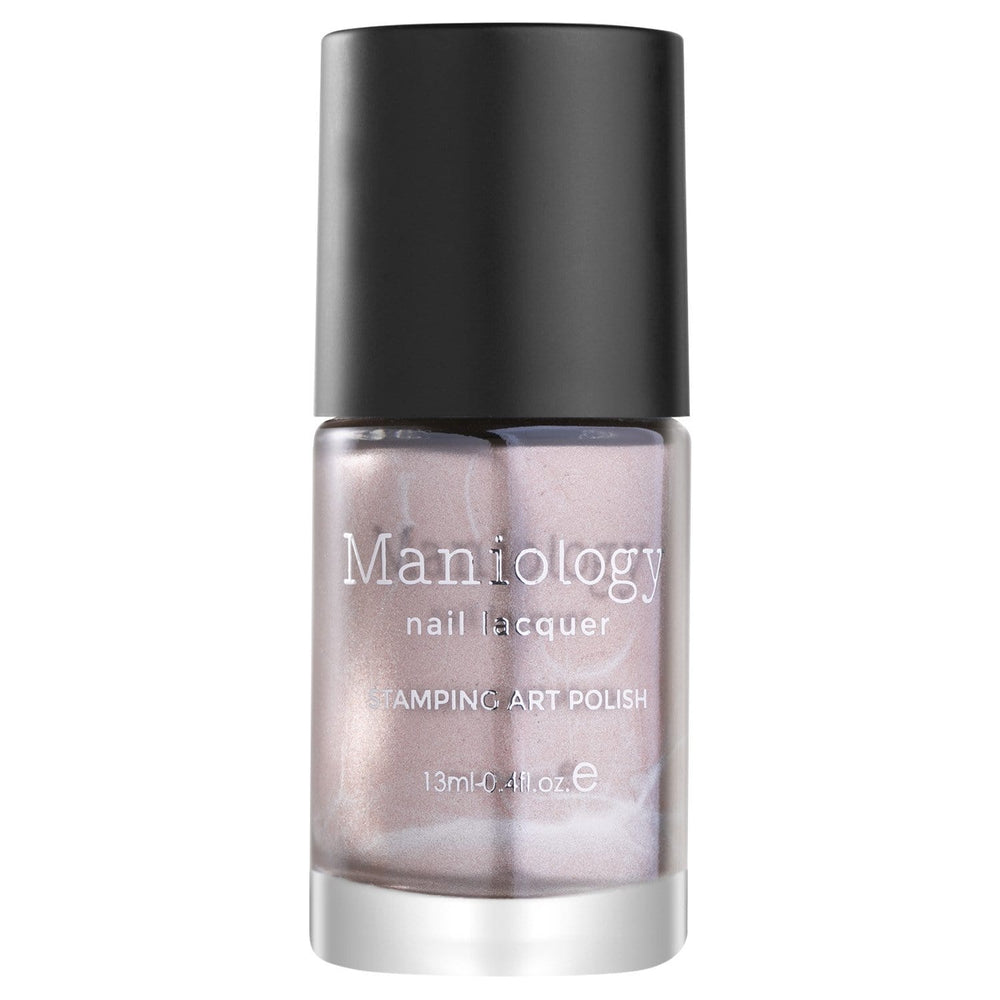 A Champagne Shimmer Stamping Polish with Creamy pale gold with hints of pink and fine glitters from our Nutcracker-inspired Snowflake Waltz holiday collection: Magic Hour by Maniology.
