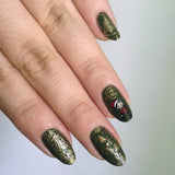 Treat Your Elf (m168) - Nail Stamping manicure featuring sweaters and elf. 