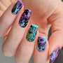 A manicured hand with coral reef, seahorse and tropical fish designs by Maniology (m146.)