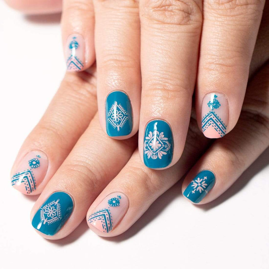 A manicured hands with Wild Heart: Casablanca designs by Maniology (m015).