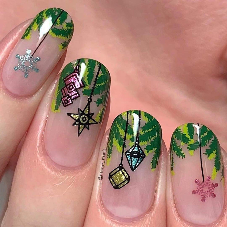 A manicured hand with layered Christmas trees an ornaments designs by Maniology (m041).